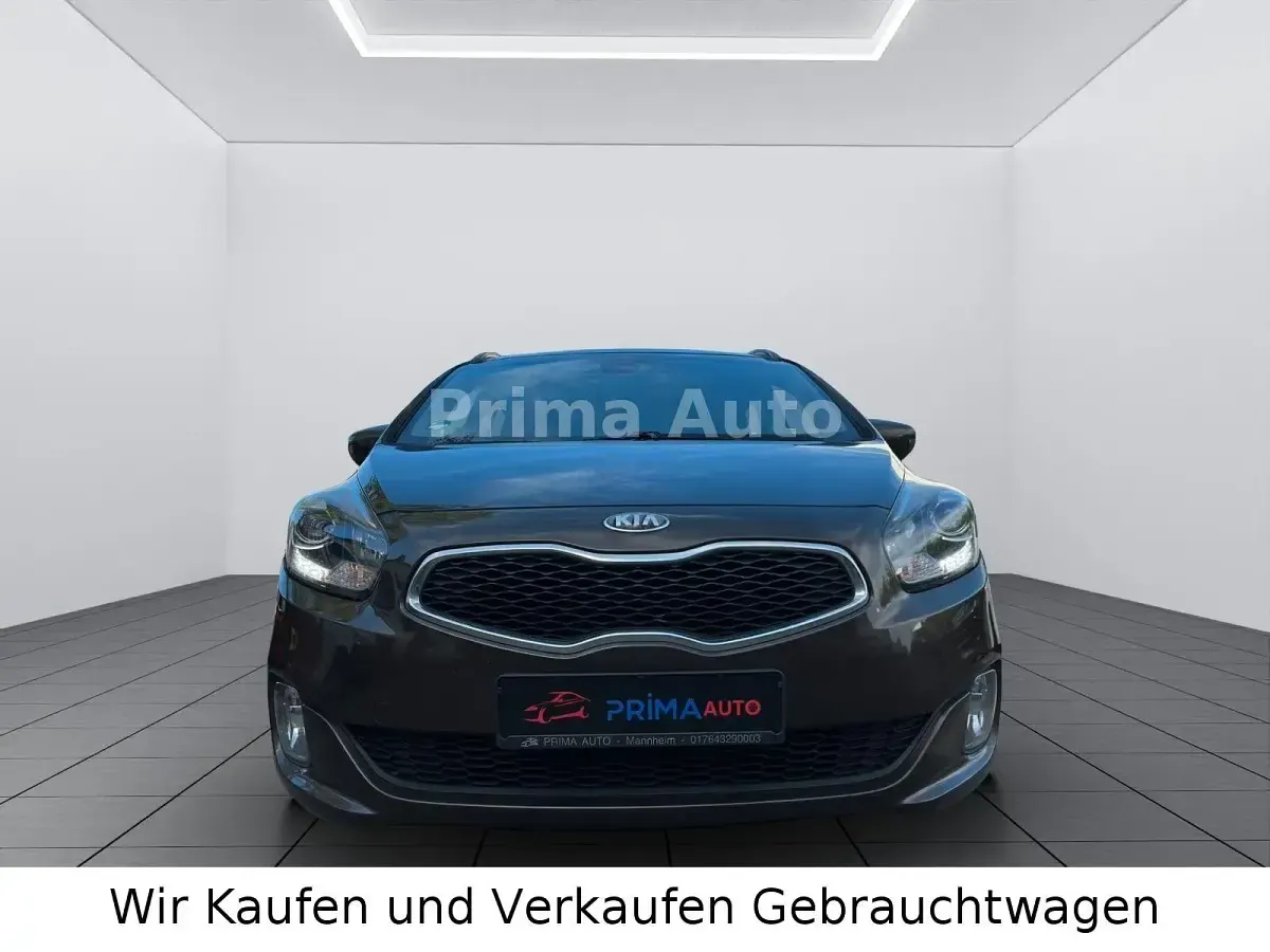 Gebraucht Kia Carens Edition 7 136 PS (100 kW) 2013 Braun Van / Kleinbus