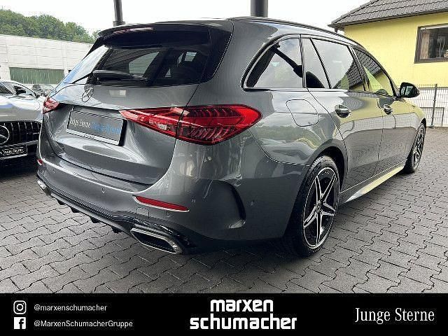 Gebraucht Mercedes C300e Business 313 PS (230 kW) 2023 Lack selenitgrau Kombi