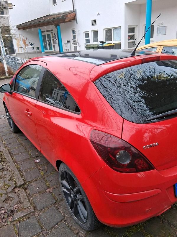 Gebraucht Opel Corsa 80 PS (58 kW) 2010 Rot Kleinwagen