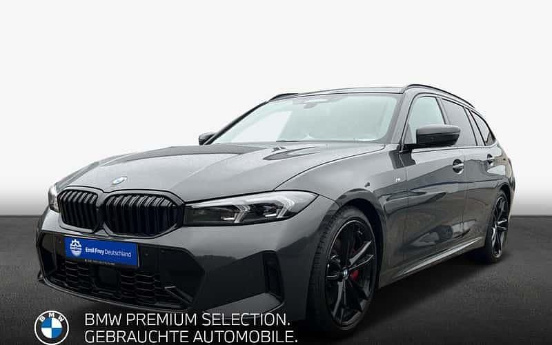 Dravitgrau metallic Gebraucht 2024 BMW 320 Performance Kombi | 55.990 € - Bild 1/4