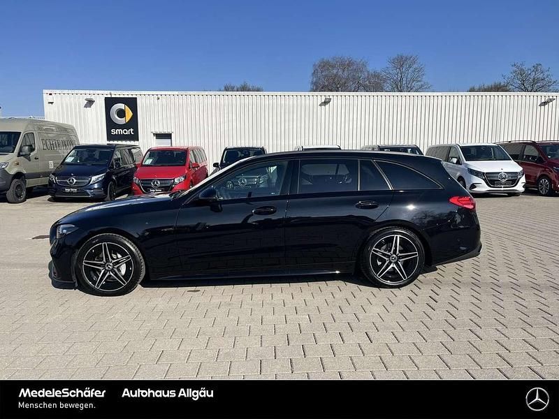 Gebraucht Mercedes C200 AMG 163 PS (119 kW) 2024 Lack obsidianschwarz Kombi
