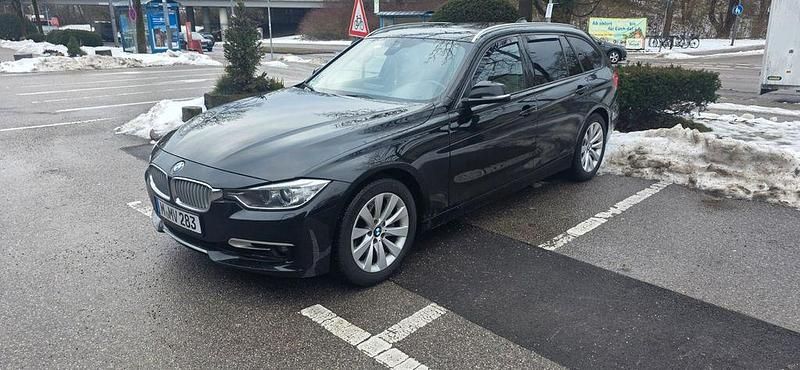 Schwarz Gebraucht 2014 BMW 335 Performance Kombi | 17.999 € - Bild 1/4