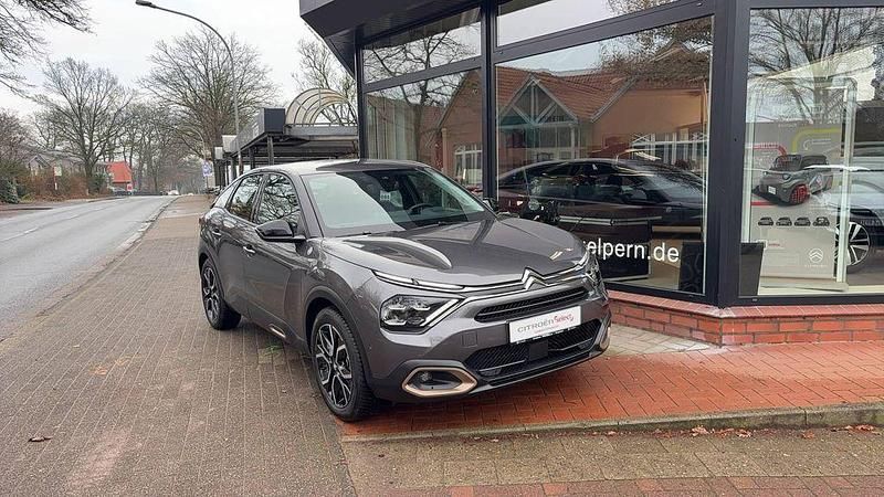 Grau Gebraucht 2023 Citroën e-C4 Limousine | 17.490 € (Superpreis) - Bild 1/4