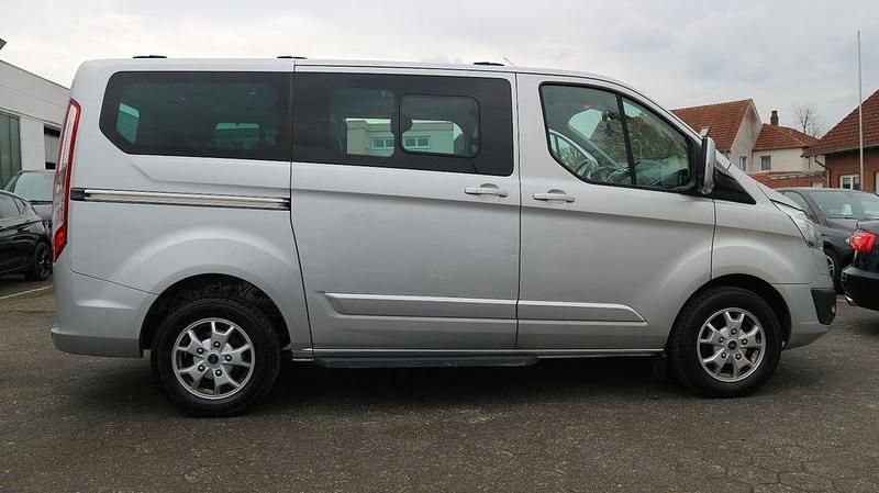 Używany Ford Transit Titanium 155 KM (114 kW) 2013 Srebrny Kombi