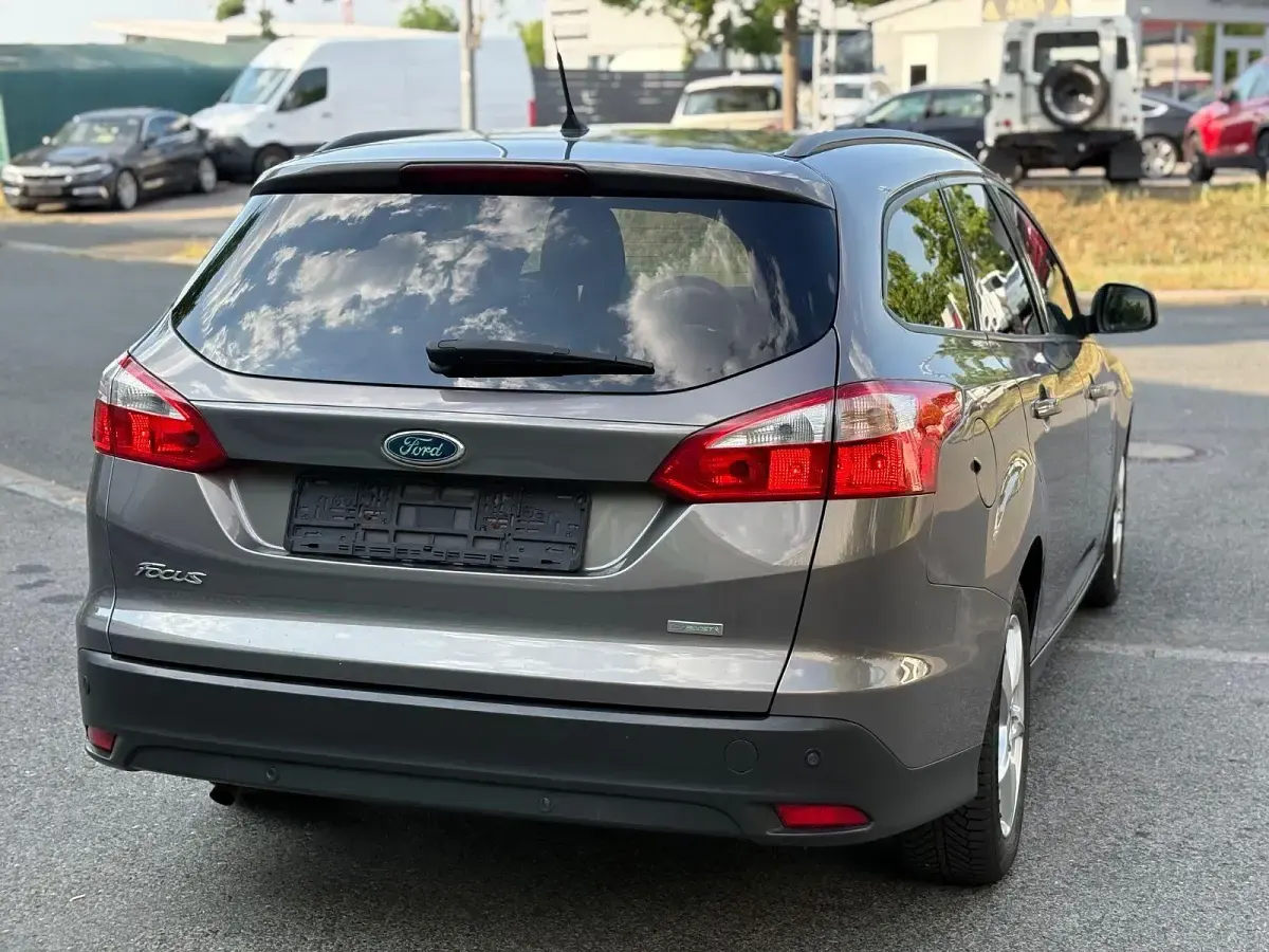 Gebraucht Ford Focus 125 PS (91 kW) 2014 Braun Kombi