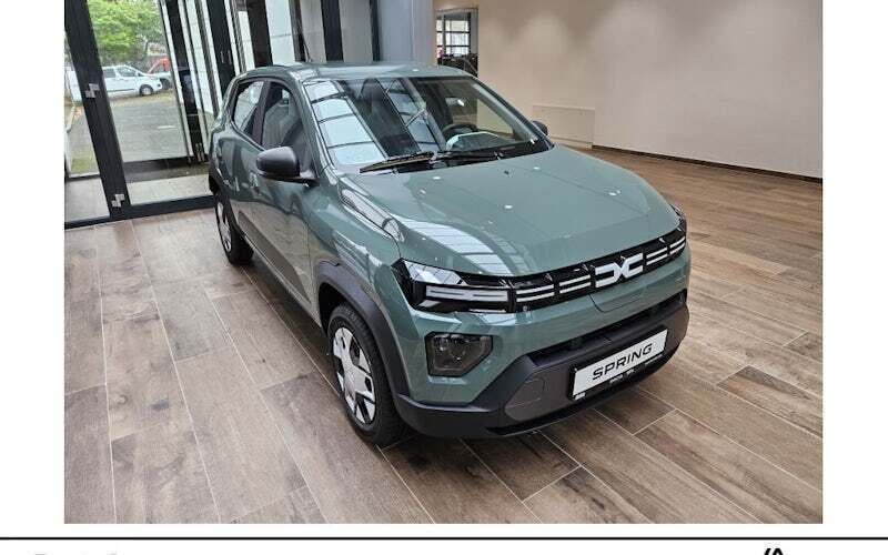 Olivgrün Neu 2024 Dacia Spring Expression Kleinwagen | 15.498 € (Fairer Preis) - Bild 1/4