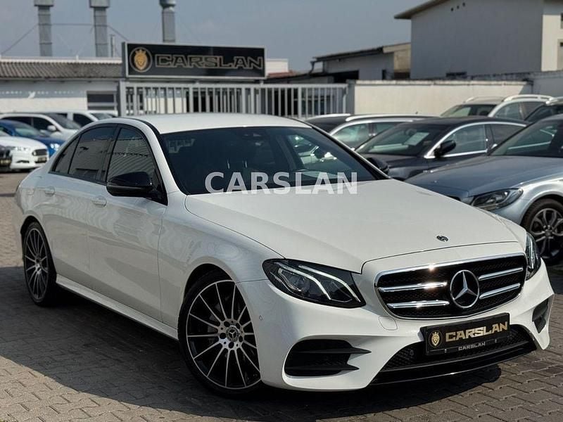 Polarweiss Gebraucht 2018 Mercedes E220 AMG Limousine | 28.998 € (Fairer Preis) - Bild 1/4