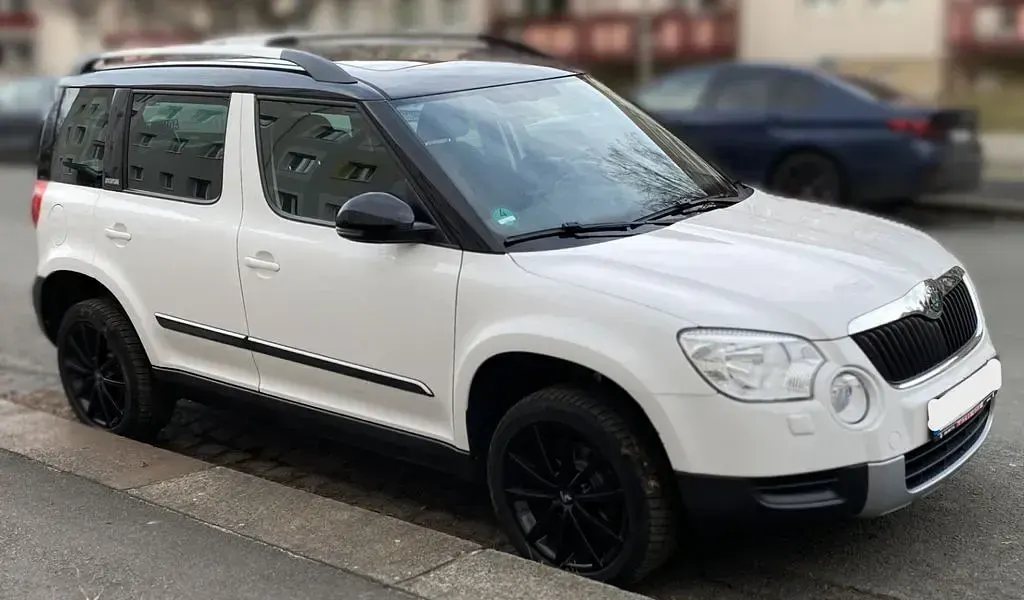 Gebraucht Skoda Yeti Adventure 122 PS (89 kW) 2013 Weiß SUV