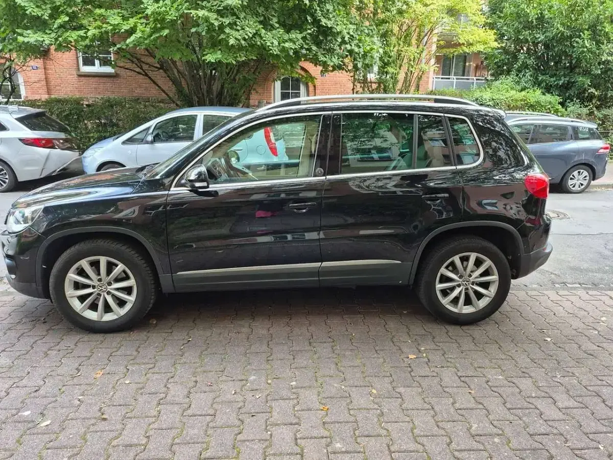 Używany VW Tiguan Team 200 KM (147 kW) 2017 Czarny SUV