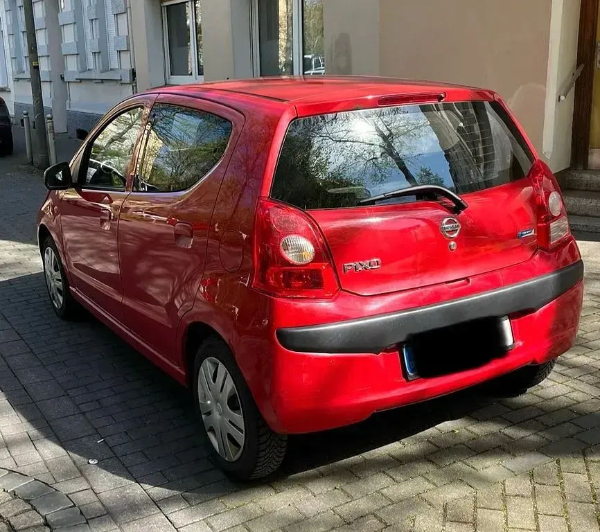 Gebraucht Nissan Pixo 68 PS (50 kW) 2009 Rot Kleinwagen