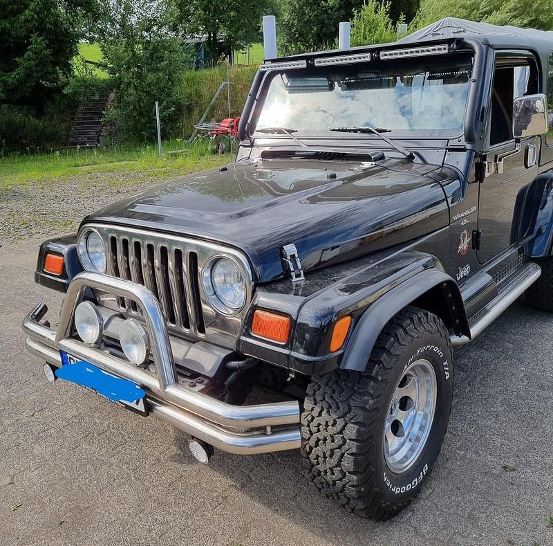 Schwarz Gebraucht 1999 Jeep Wrangler Sahara SUV | 23.250 € (Etwas zu teuer) - Bild 1/4