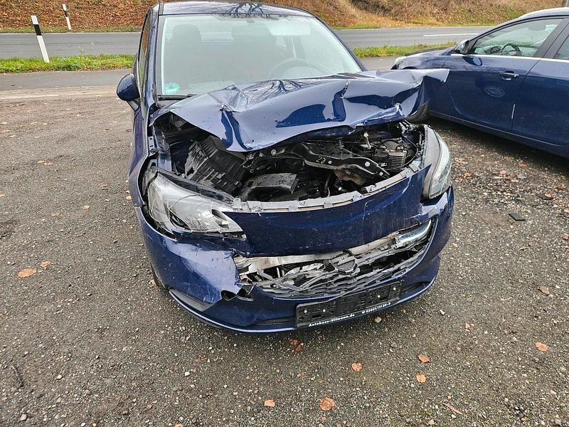 Blau Gebraucht 2016 Opel Corsa Kleinwagen | 950 € - Bild 1/4