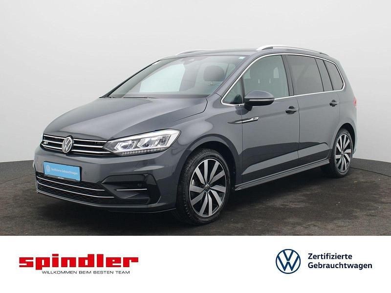 Delfingrau metallic Gebraucht 2024 VW Touran R-line Van / Kleinbus | 35.980 € (Fairer Preis) - Bild 1/3