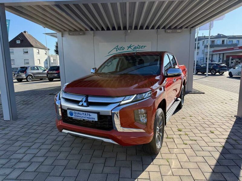 Orange (metallic) Gebraucht 2020 Mitsubishi L200 Edition Abholung | 29.990 € (Fairer Preis) - Bild 1/2