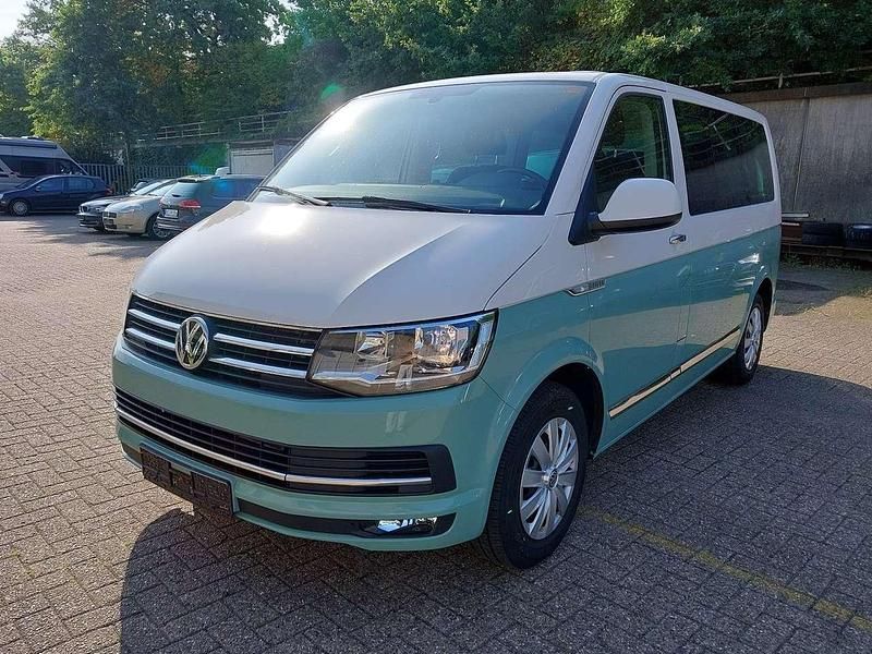 Weiß und grün foliert Gebraucht 2019 VW Multivan Van | 33.900 € (Guter Preis) - Bild 1/4