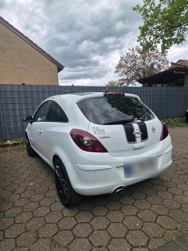 Second-hand Opel Corsa 74 CP (54 kW) 2013 Alb Hatchback