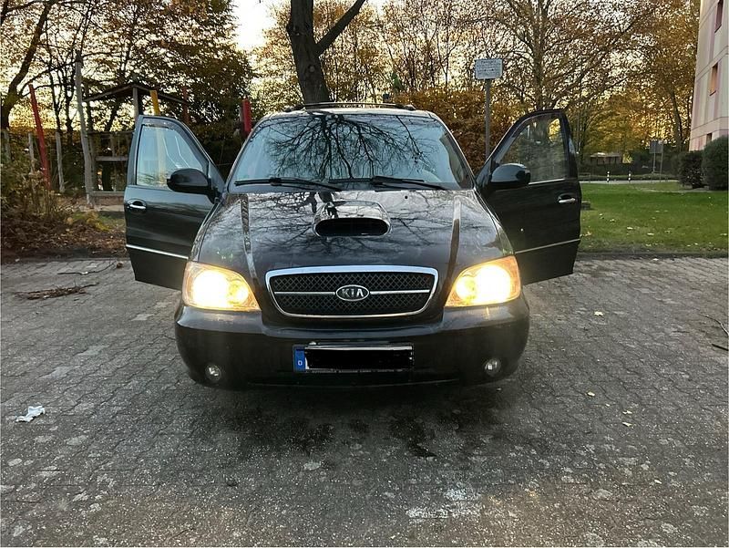 Schwarz Gebraucht 2005 Kia Carnival Van / Kleinbus | 2.450 € (Fairer Preis) - Bild 1/4