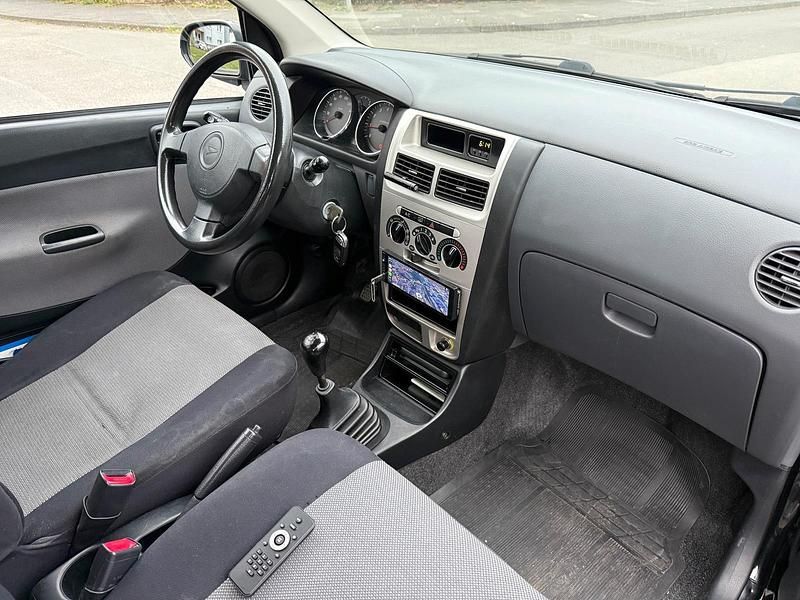 Gebraucht Daihatsu Cuore 58 PS (42 kW) 2006 Schwarz Kleinwagen