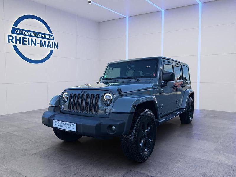 Grau Gebraucht 2014 Jeep Wrangler Sahara SUV | 27.900 € (Teuer) - Bild 1/4