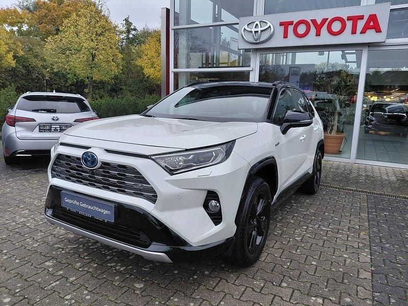 Novaweiß perleffekt / dach schwarz Gebraucht 2019 Toyota RAV4 Hybrid Style SUV | 30.990 € (Etwas zu teuer) - Bild 1/4