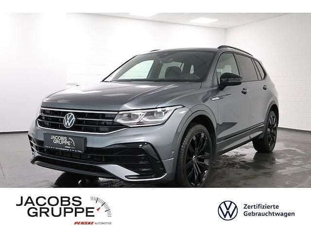 Platinum grey Gebraucht 2024 VW Tiguan Allspace R-line SUV | 41.970 € (Fairer Preis) - Bild 1/3