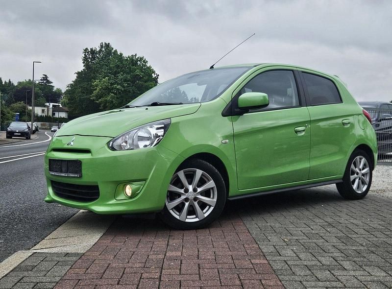 Grün Gebraucht 2014 Mitsubishi Space Star Kleinwagen | 5.300 € (Fairer Preis) - Bild 1/4