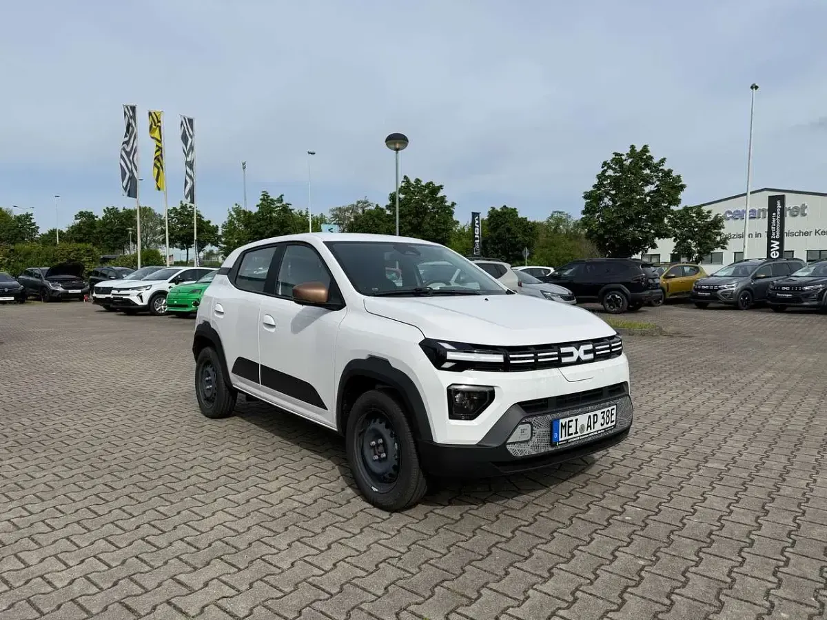 Gebraucht Dacia Spring Extreme 47 kW (65 PS) 2025 Polarweiss Kleinwagen