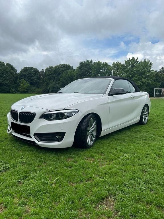 Schwarz Gebraucht 2018 BMW 220 Advantage Cabrio | 23.890 € (Fairer Preis) - Bild 1/4