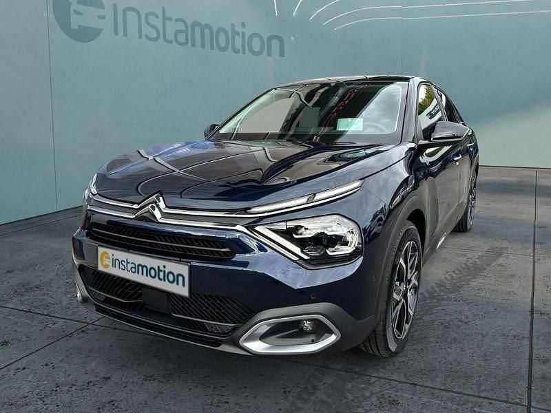 Blau Gebraucht 2024 Citroën e-C4 Limousine | 29.249 € (Superpreis) - Bild 1/4