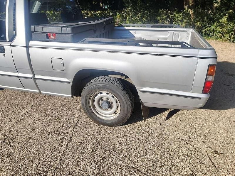 Gebraucht Mitsubishi L200 120 PS (88 kW) 1987 Silber Abholung