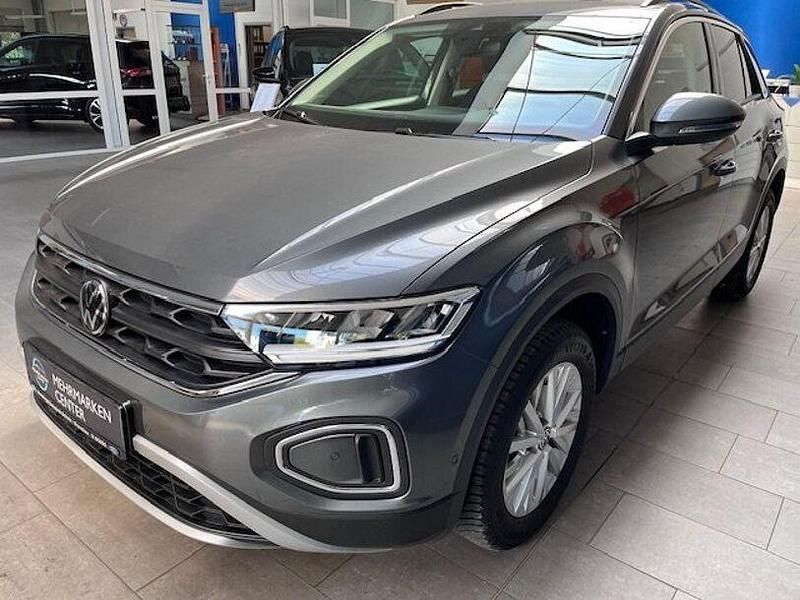 Indiumgrau metallic Gebraucht 2024 VW T-Roc Life SUV | 23.990 € (Fairer Preis) - Bild 1/4