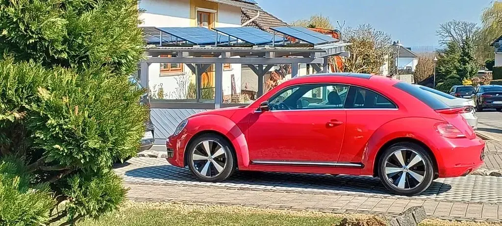 Używany VW Beetle Sport 200 KM (147 kW) 2013 Czerwony Hatchback