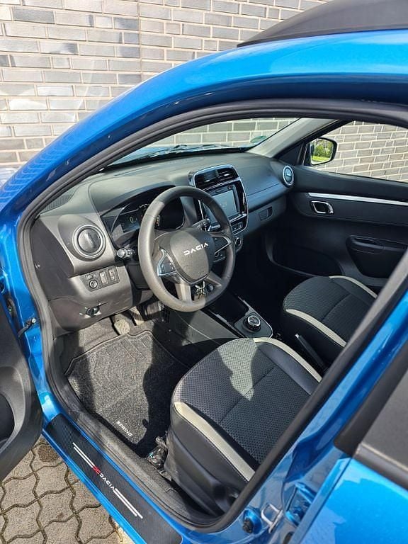 Gebraucht Dacia Spring Essentiel 33 kW (45 PS) 2023 Blau Kleinwagen