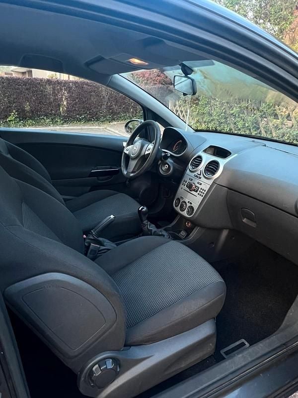 Gebraucht Opel Corsa 60 PS (44 kW) 2012 Grau Kleinwagen