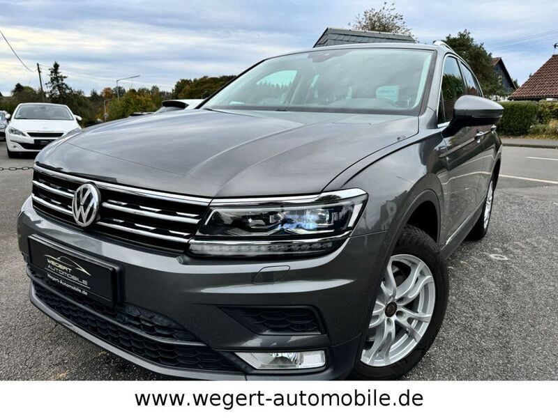 Indiumgrau metallic Gebraucht 2017 VW Tiguan Sound SUV | 18.997 € (Guter Preis) - Bild 1/4