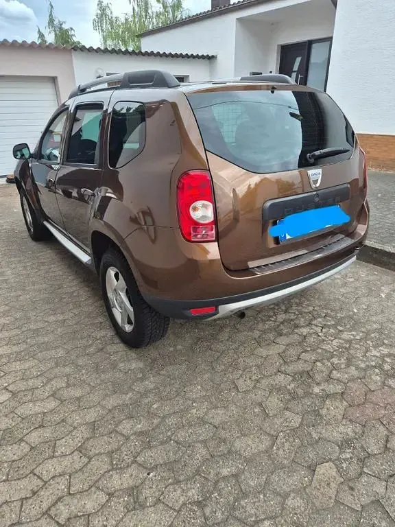 Używany Dacia Duster Prestige 105 KM (77 kW) 2011 Brązowy SUV