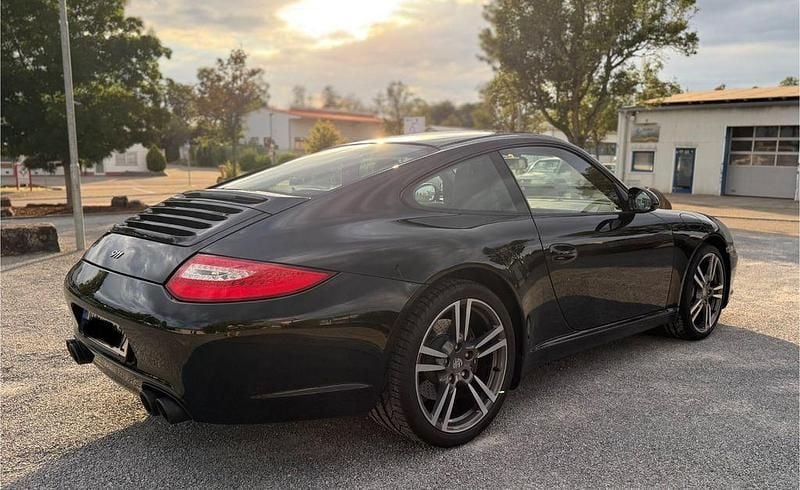 Schwarz Gebraucht 2011 Porsche 911 Carrera Black Edition Coupé | 69.911 € (Fairer Preis) - Bild 1/4