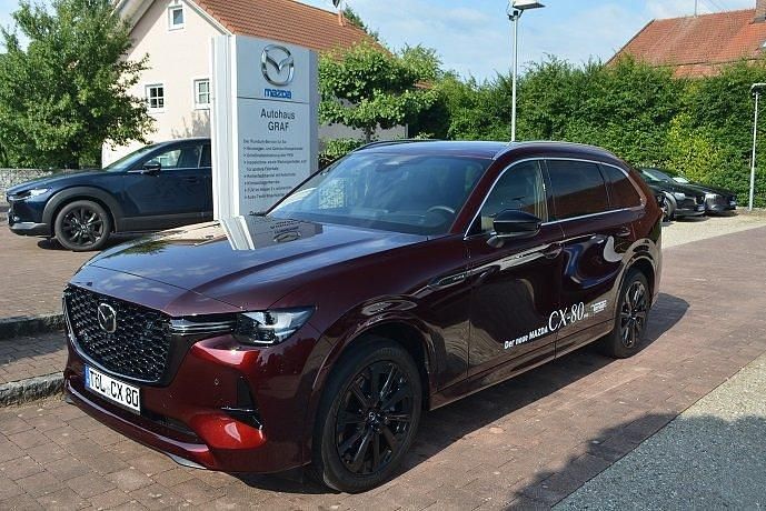 Artisan red Gebraucht 2025 Mazda CX-80 Homura-Line SUV | 59.990 € (Fairer Preis) - Bild 1/4