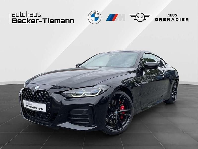Saphirschwarz Gebraucht 2022 BMW M4 M Sport Coupé | 44.911 € (Guter Preis) - Bild 1/4