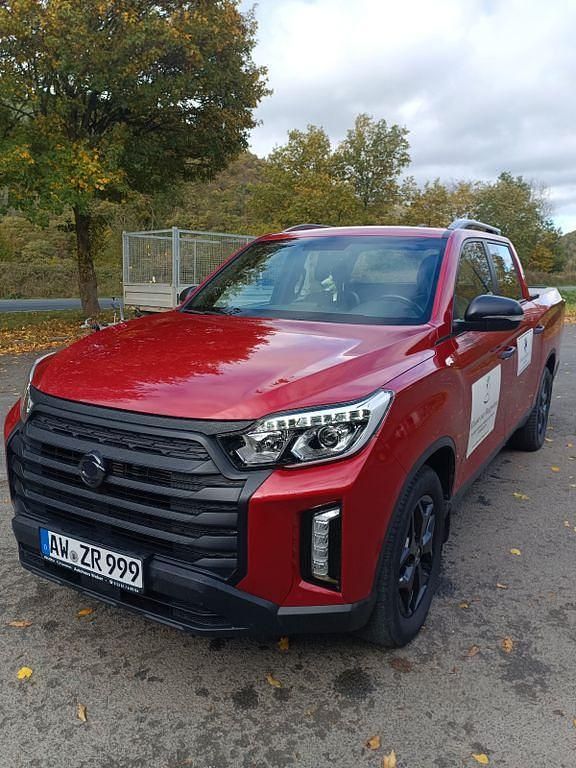 Rot Gebraucht 2023 Ssangyong (KGM) Musso SUV | 28.900 € (Fairer Preis) - Bild 1/4