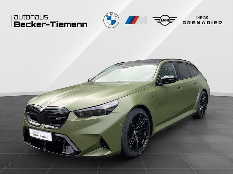 Grün Gebraucht 2025 BMW M5 Exclusive Kombi | 131.990 € - Bild 1/4