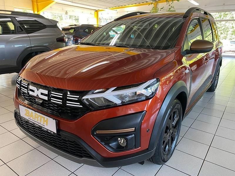 Terrakottabraun Gebraucht 2024 Dacia Jogger Extreme Van / Kleinbus | 23.990 € (Teuer) - Bild 1/4