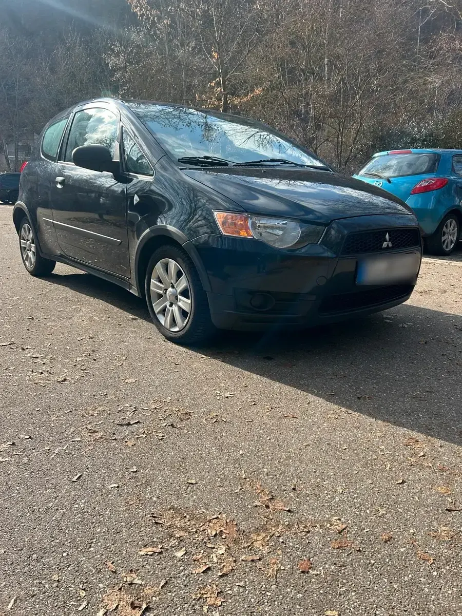 Second-hand Mitsubishi Colt 75 CP (55 kW) 2011 Negru Hatchback