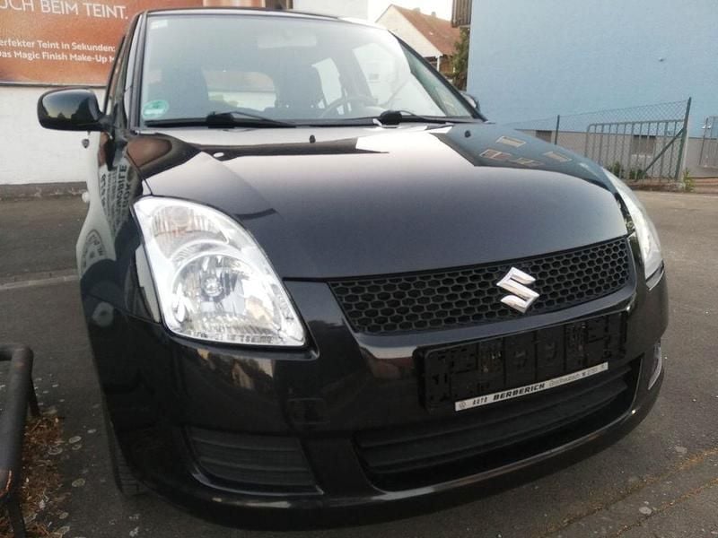 Second-hand Suzuki Swift 92 CP (67 kW) 2009 Negru Hatchback
