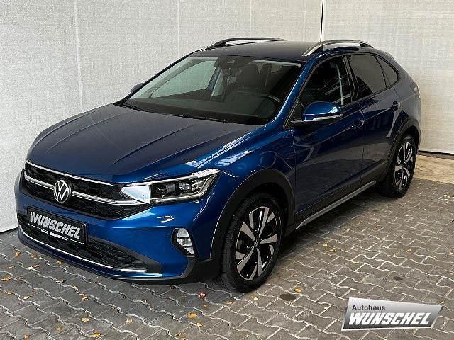 Blau Gebraucht 2023 VW Taigo Style SUV | 24.940 € (Teuer) - Bild 1/4