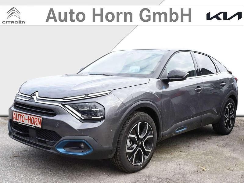 Platinumgrau metallic Gebraucht 2023 Citroën e-C4 Shine Limousine | 22.990 € (Fairer Preis) - Bild 1/4