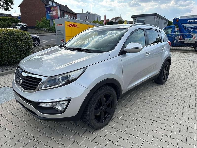 (9s) machine silver m Gebraucht 2012 Kia Sportage Attract SUV | 7.490 € (Guter Preis) - Bild 1/4