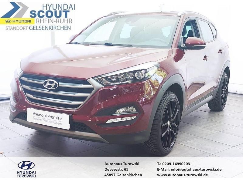 Ruby wine (metallic) Gebraucht 2015 Hyundai Tucson Intro Edition SUV | 15.970 € (Etwas zu teuer) - Bild 1/4