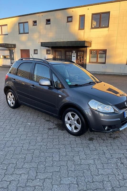 Grau Gebraucht 2010 Suzuki SX4 SUV | 5.000 € (Fairer Preis) - Bild 1/4