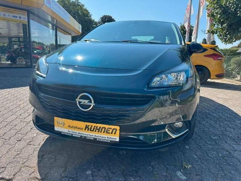 Grün Gebraucht 2016 Opel Corsa Color Edition Kleinwagen | 8.500 € (Fairer Preis) - Bild 1/4